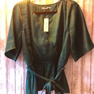 Green silky blouse